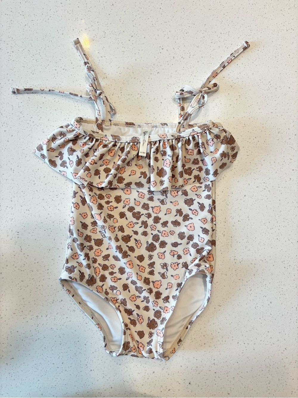 Rylee + Cru Floral Ruffle One-Piece Swimsuit in Cream and Brown